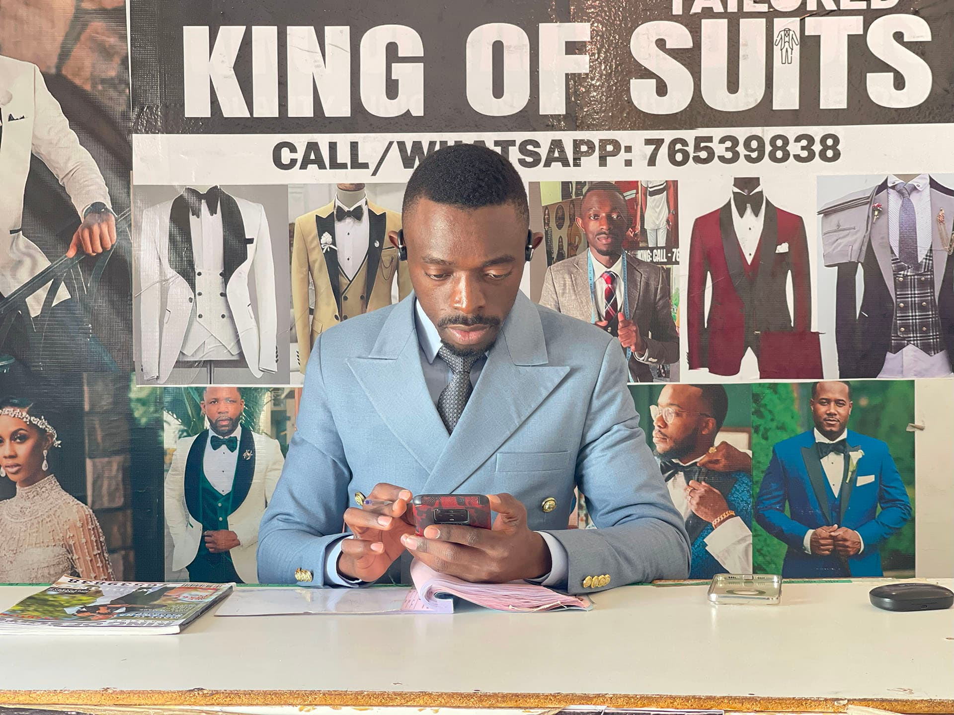 King of Suits tailor at work in the studio